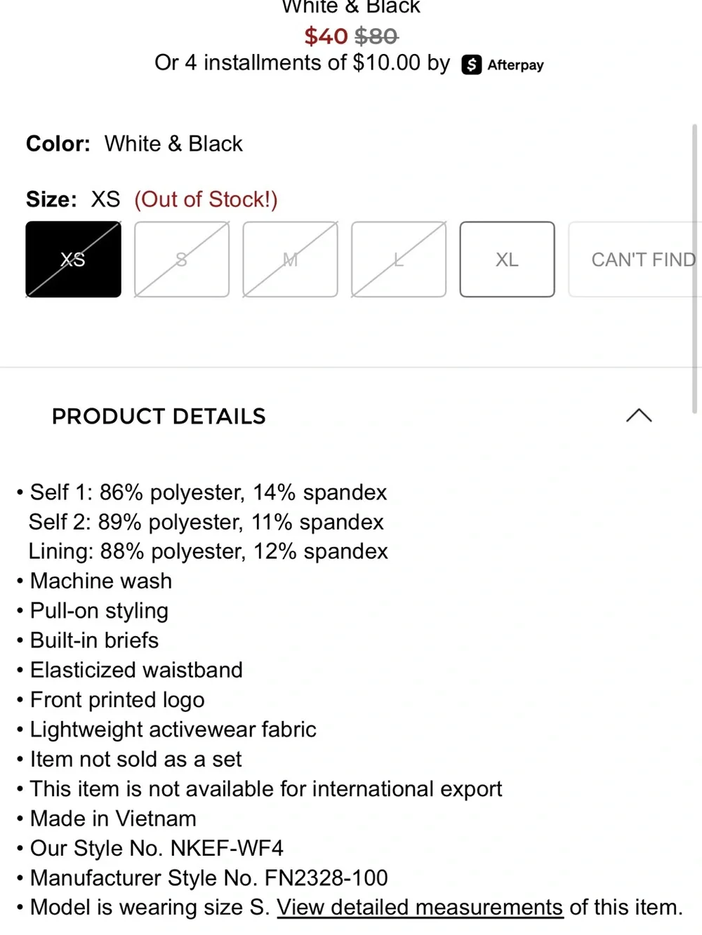 Nike Women's White Athletic Shorts with Black Swoosh